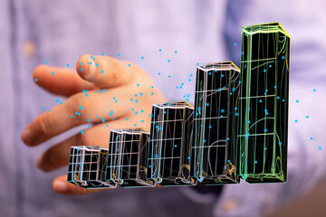 Hand interacting with a 3D bar graph, showcasing data analysis and business growth.