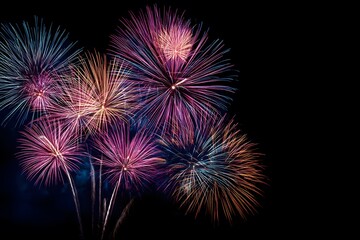 8k colorful banner wallpaper fireworks display on the dark night sky for the celebration and joy of a holiday festival, new year, or other special events. 