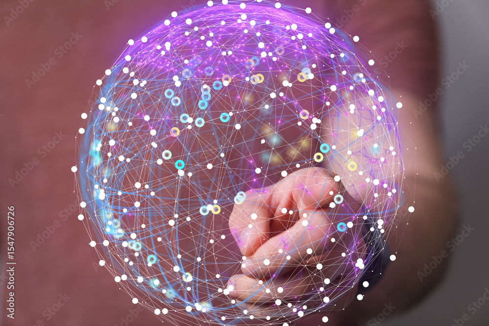 Poster Abstract image of a global network connection visualized as a sphere held in a person's hand.