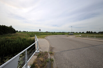 Meadows, fields and roads in the Middengebied area where new village Cortelande will arise