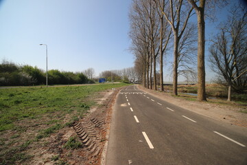 Fototapeta premium Meadows, fields and roads in the Middengebied area where new village Cortelande will arise