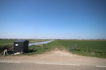 Meadows, fields and roads in the Middengebied area where new village Cortelande will arise