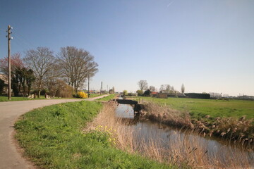 Fototapeta premium Meadows, fields and roads in the Middengebied area where new village Cortelande will arise