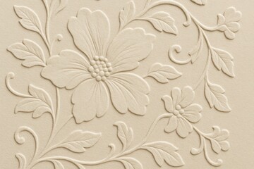 Elegant Floral Relief Design with Delicate Petals and Intricate Leaf Patterns on Cream Background