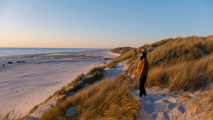 Stunning sunset at a serene beach in Denmark revealing golden sands and gentle waves