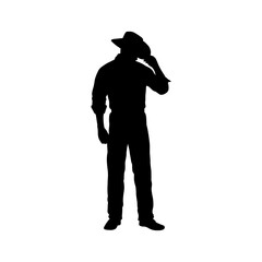 Cowboy holding a hat 