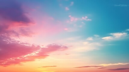 Fototapeta premium Vibrant sunset clouds painted across a gradient sky, forming an abstract natural texture