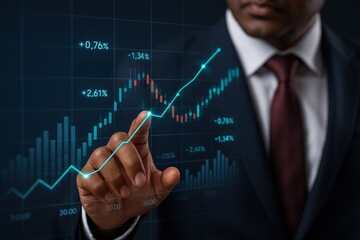 Businessman pointing at rising financial growth chart on digital screen