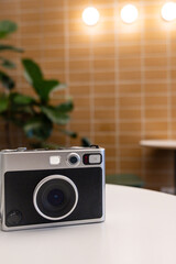 Camera on a table — a quiet moment before creativity begins.