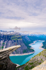 Breathtaking view from the cliffs edge overlooking the stunning fjord in Norway