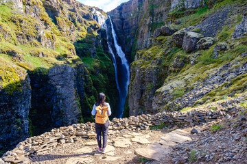 Explore the breathtaking landscapes near a stunning waterfall in Iceland