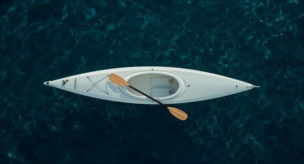 A scenic view of snow capped mountains under a cloudy sky with a valley in the foreground view