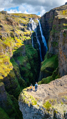 Exploring the stunning landscapes of Iceland with breathtaking waterfalls and rugged cliffs