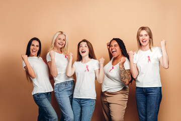 Diverse women celebrating breast cancer awareness month