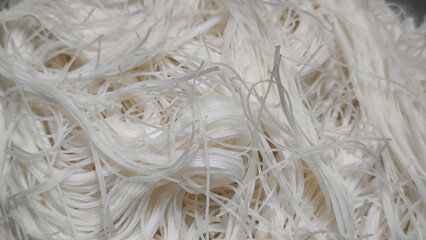 White noodles Chinese food in a restaurant