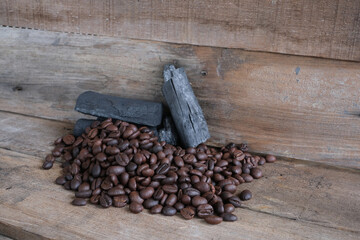 Coffee beans on a wooden background