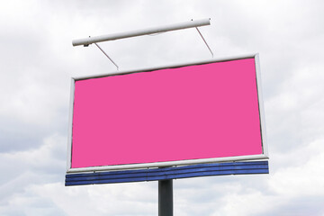 Blank pink billboard sign. Outdoor advertising template. Empty marketing space. Urban background with sky. Ready for commercial design.