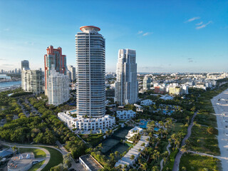 Fototapeta premium Top view of South Miami Beach and the ocean. Miami skyline with skyscrapers. Aerial view of Miami in summer. Miami shore with luxury buildings. Scenic drone view of Miamis famous coastline.
