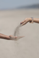 hands on the beach