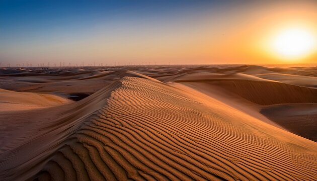 desert at sunrise morning glow over dunes and inland sea of sealine desert just out of doha qatar