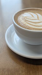 Close-up of Latte with Elegant Leaf Latte Art