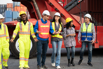Group of engineer or workers at container site	
