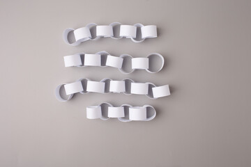 step in a Halloween themed DIY craft, assembling body parts before adding the finishing touches,...