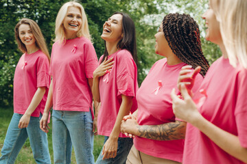 Women smiling and walking together for breast cancer awareness
