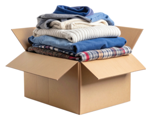 angled View of Clothes Overflowing from Open Box with Soft Fabrics Visible, Isolated on Transparent Background