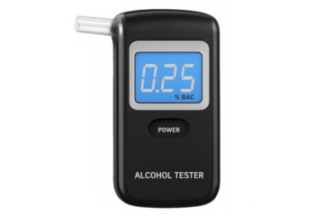 Alcohol tester showing positive blood alcohol content on transparent background