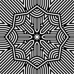 A complex black and white pattern features interwoven lines and curves arranged symmetrically, creating a visually striking effect