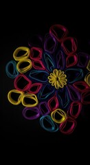 Vibrant, colorful, paper-crafted flower design on a dark background.