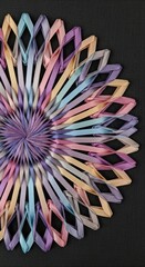 Pastel paper strips intricately woven into a radiant, circular mandala design.