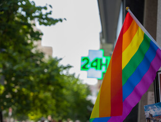 rainbow flag in the street, symbol of tolerance and acceptance, diversity, hope and longing
