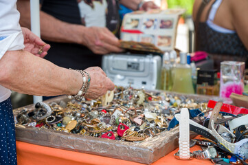 A person looking for some deals in a flea market