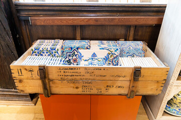 London, UK, 15 May 2025,  Liberty shop.  A Box Full of Decorative Tiles.