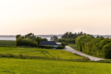 Nykobing Mors, Denmark A coastal country road leads to the Limfjord. © Alexander
