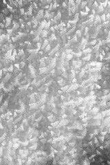 Snowy Ice Crystals on Ground During Cold Winter