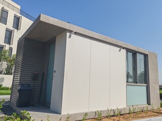 Security Booth Container with Glass Window on both side. Security Eneterence Checking Control Point Outdoor. Full View Portable container House or Home Cabin having Gray color for control Traffic.