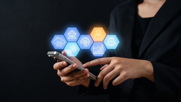 A person in a dark blazer uses a smartphone with floating hexagonal icons representing AI, data, and technology concepts.