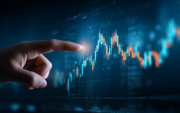 A hand points to a vibrant orange and blue candlestick financial chart, symbolizing investment, stock market growth, and modern business trends against a dark background.

