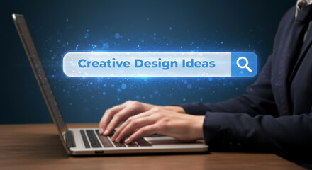 Ideas on Demand: A close-up captures hands on a keyboard searching for creative design ideas, a...