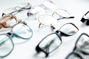 Set with different eyeglasses with lenses isolated on white