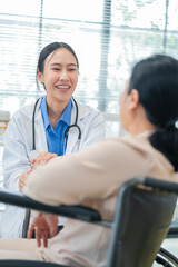 experienced female medical professional explains test results to a female patient during a clinic consultation. reviewing reports and discussing diagnosis and treatment options.compassionate care