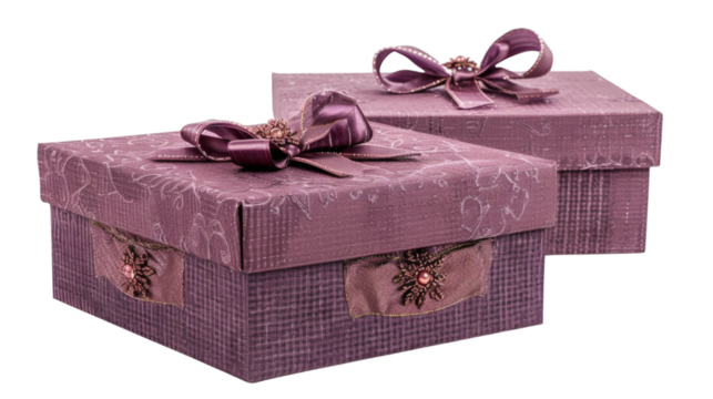 Two purple gift boxes with delicate ribbons isolated on a white background