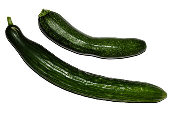Close up of home grown cucumber courgette zucchini baby marrow vegetable skin  green on white background