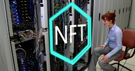 Sitting IT tech managing cables near server racks in server room, with NFT overlay, copy space