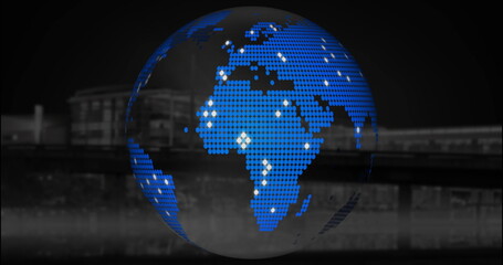 Blue pixel globe flickering above night harbor, with blurred silhouettes and water reflections