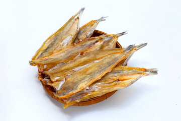Sun dried black kingfish on white background.