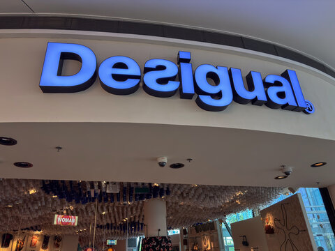 Bratislava, Slovakia, Europe - Jun 21, 2025: a bright desigual store sign with blue letters above the entrance to a unique fashion retail shop with an artistic ceiling design, concept of clothing